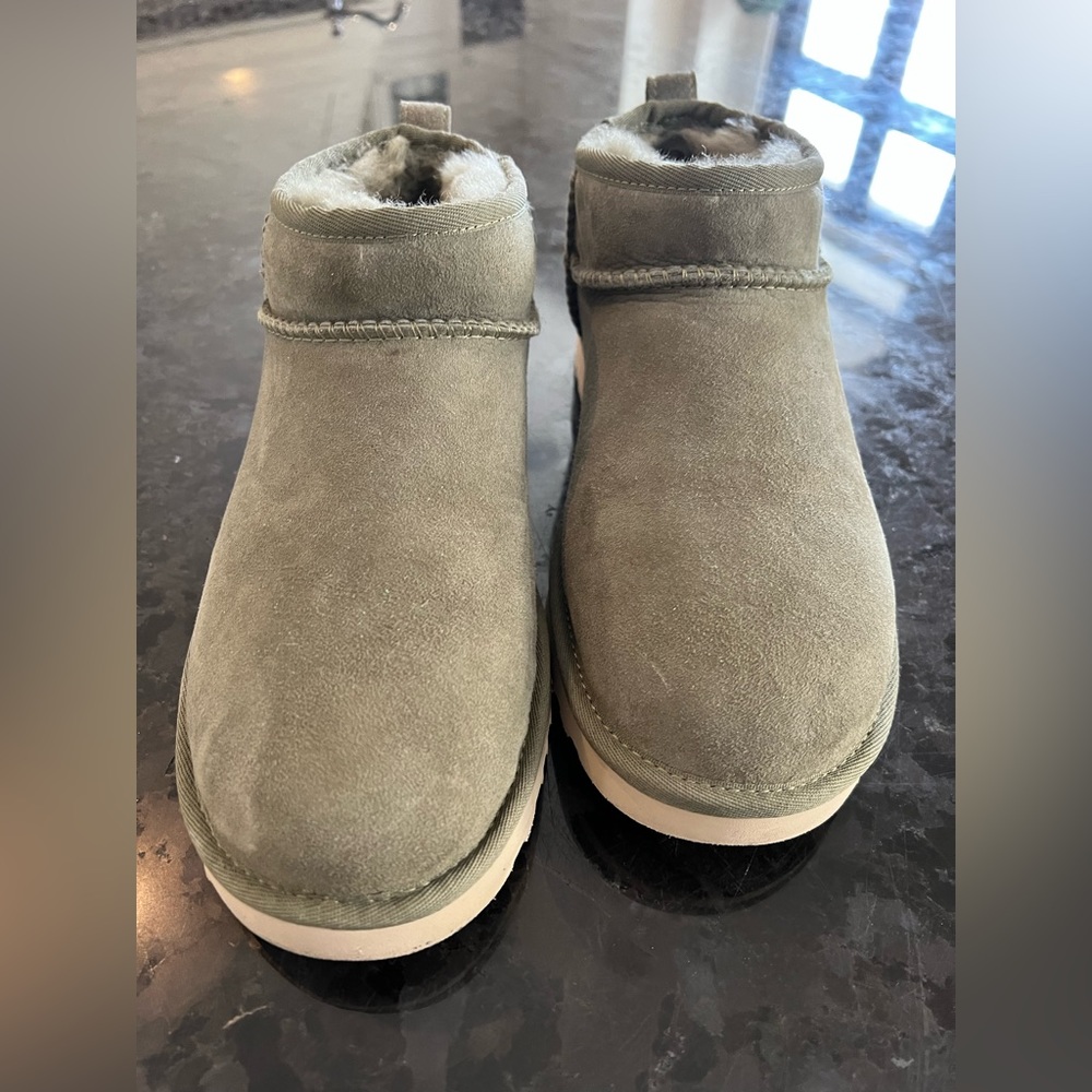Low rise women's UGG boots in olive green.